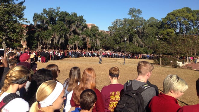 Students gathered on Landis Green the morning after the shooting.