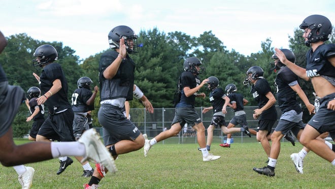 Will Wellesley High football players (pictured) get a chance to play this fall? On Tuesday, the MIAA met to discuss high school sports but didn't discuss a new timeline for this fall amid COVID-19 concerns. Instead, they discussed football re-alignment for the 2021 season.