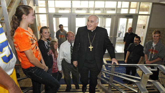 St. Cloud diocese Bishop Donald Kettler tours Cathedral High School in 2013.