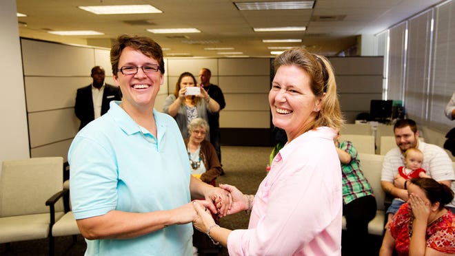 Susan Amann and Lisa Brimhall were the second same-sex couple to be married in Lee County on Tuesday.