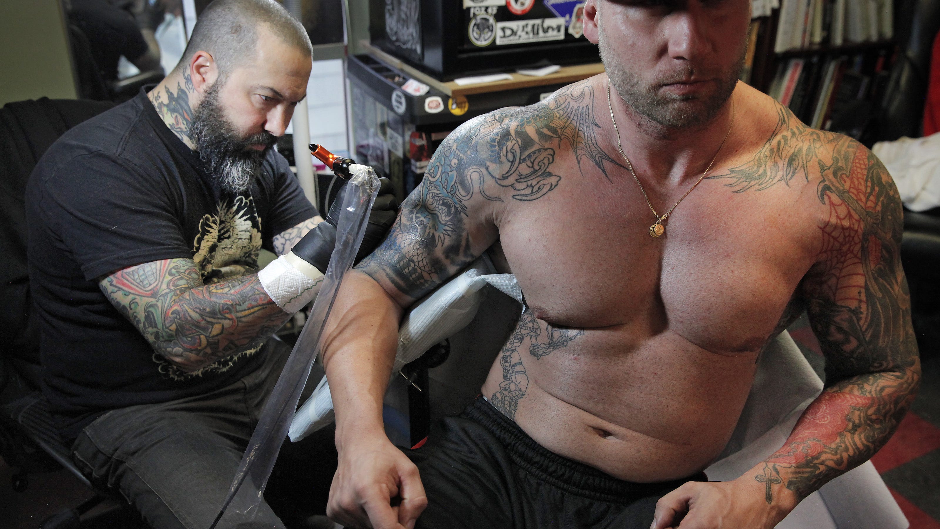Cuomo signs tattoo bill into law