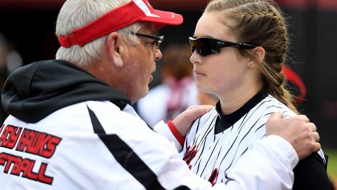 South Side's head coach Pete Richardson talks with his pitcher Kayla Beaver during an inning change of their game against McNairy County, Monday, March 12.