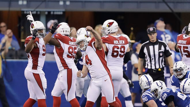 Arizona Cardinals' Phil Dawson (4) celebrates after kicking a game winning 30-yard field in overtime of an NFL football game against the Indianapolis Colts, Sunday, Sept. 17, 2017, in Indianapolis.
