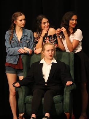 Victoria Hassell, Alexes Huff and Aubree Mills surround Amber Leimbach in one of the final scenes.