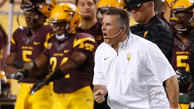 ASU coach Todd Graham is upset with his team after a penalty was called against them during the first quarter of an game against Weber State at Sun Devil Stadium on Aug. 28, 2014.