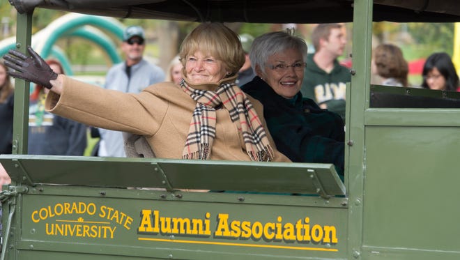 The Colorado State University community enjoys the Homecoming Parade, October 11, 2013.