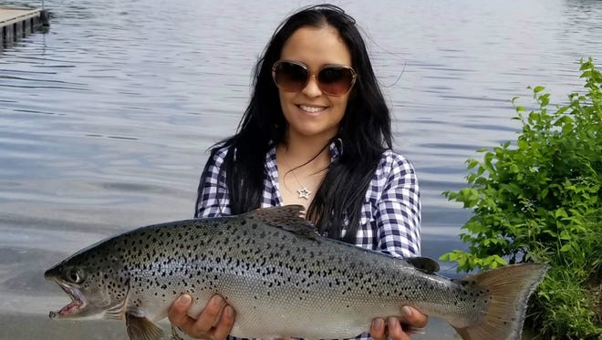 Runelevy Rodriguez of Northvale reeled in the new record Landlocked Salmon on June 2.