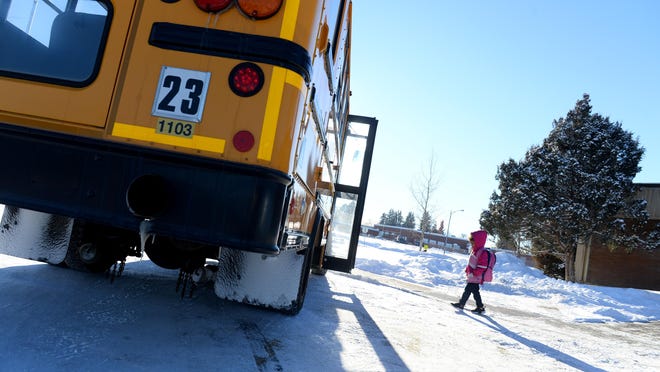 An MSDB student walks to the school bus after school Wednesday. The school offered to return $250,000 of its state funding at the request of lawmakers. The offer was refused.