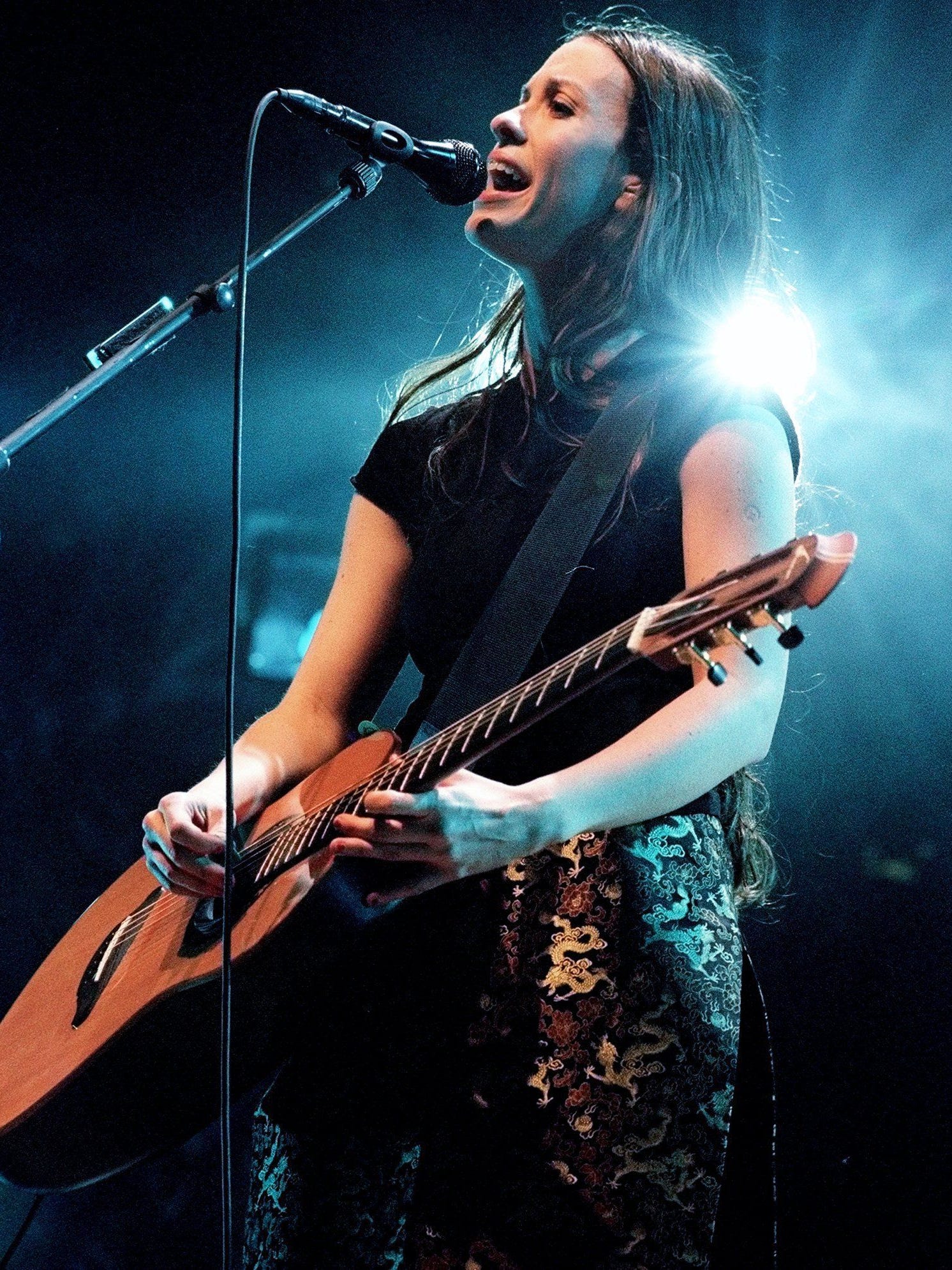 Alanis Morissette Shares Lessons She S Learned About Mental Issues This music video plays on the television in the store. alanis morissette shares lessons she s