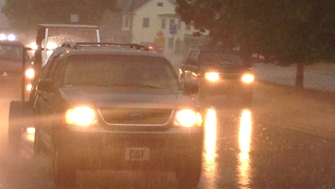 Rain pounds down on Kirkwood Highway in Prices Corner area Tuesday night.