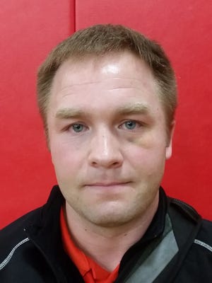 Cherokee wrestling coach Mike Booth