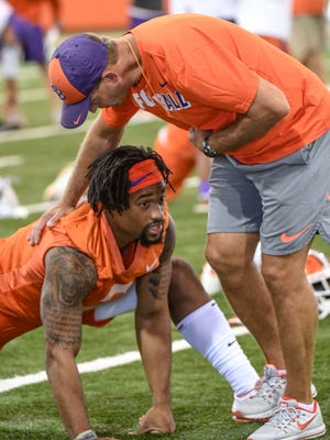 Clemson head coach Dabo Swinney greets Clemson wide receiver Amari Rodgers (3) during the first day of practice at the Clemson Indoor Football facility at Clemson on Friday, August 3, 2018.