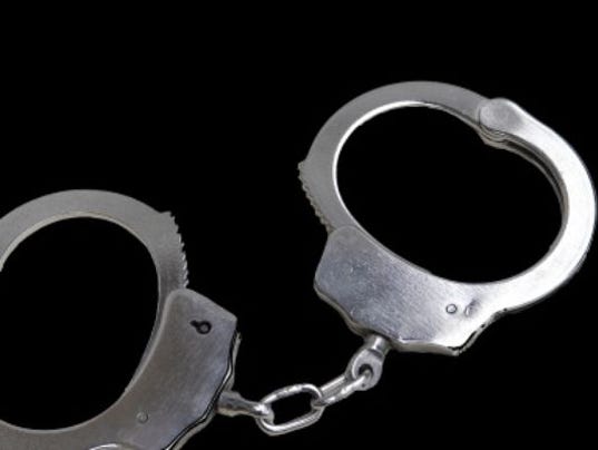 635971717060386870-1407859228000-handcuffs.jpg