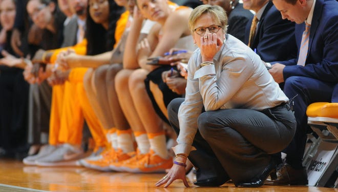 Tennessee coach Holly Warlick crouches on the sideline during a game between Missouri and Tennessee in Thompson-Boling arena Thursday, Feb. 9, 2017. Tennessee overtook Missouri in the fourth quarter, 77-66.