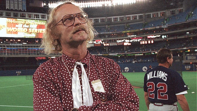 Canadian author W.P. Kinsella stands on the baseball field before game five of the World Series between Toronto Blue Jays and Atlanta Braves at the Skydome in Toronto, Ontario, Thursday, Oct. 23, 1992.  Kinsella, who wrote "Shoeless Joe" which was made into the movie "Field of Dreams," is attending his first World Series.