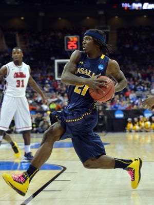 La Salle Explorers guard Tyrone Garland drives to the basket against Mississippi during the 2013 NCAA tournament.
