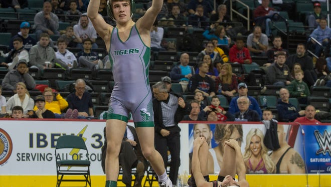 South Plainfield's Joe Heilman signals to the crowds after taking fifth in consolations. Consolation round matches for 3rd, 4th, 5th and 6th place in NJSIAA State Wrestling Tournament in Atlantic City on March 6, 2016. 