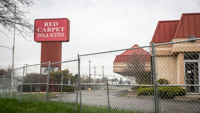File photo of the Red Carpet Inn as crews gutted its 150 rooms in the spring of 2018.