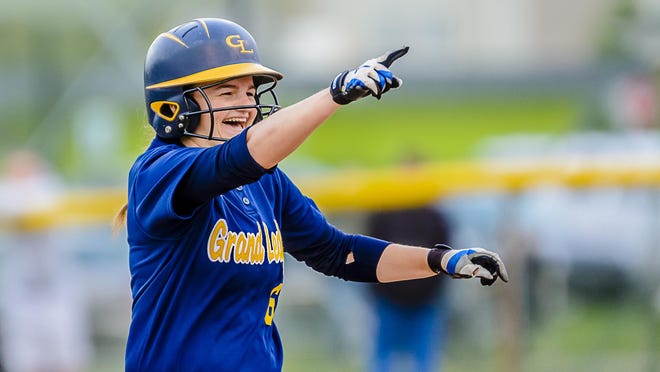 Emily Songer of Grand Ledge celebrates her 2 run homer to give the Comets a 2-0 lead in the 1st inning of their Softball Classic 1st round game with Mason Monday May 16, 2016 at Ranney Park in Lansing. KEVIN W. FOWLER PHOTO