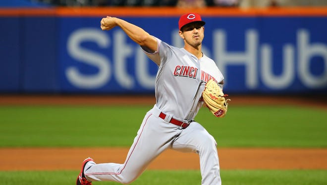 Cincinnati Reds  starting pitcher Tyler Mahle (30) pitches against the New York Mets during the first inning at Citi Field.