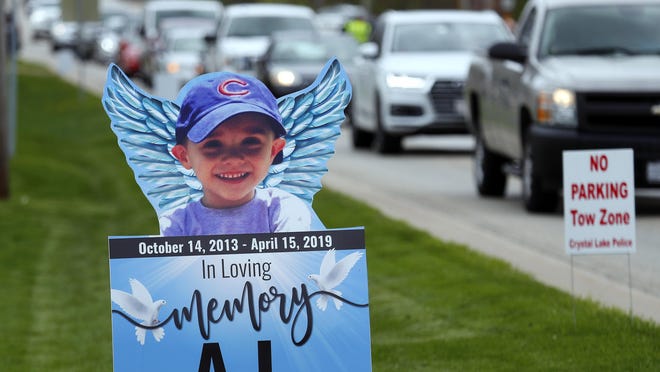 In this May 3, 2019, file photo, cars line up as mourners head to visitation services for AJ Freund at Davenport Funeral Home in Crystal Lake. AJ's mother, JoAnn Cunningham, faces up to 60 years in prison for his death.