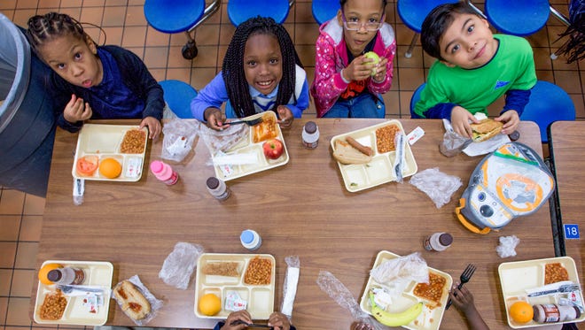 File photo. Students eat lunch at Brewbaker Primary School in Montgomery, Ala., on Friday January 20, 2017.