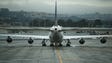 A United Airlines Boeing 747 sits on a tarmac at