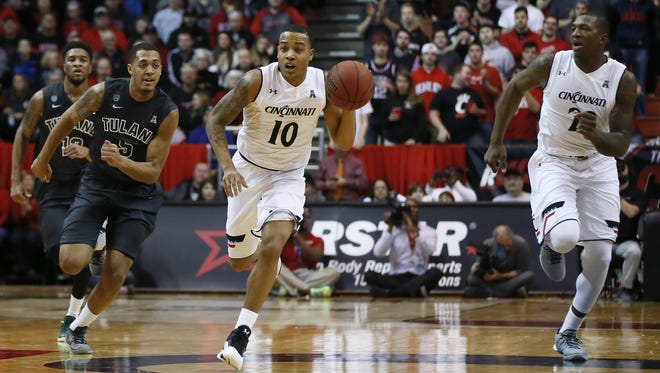 Paul Daugherty says he knows Bearcats point guard Troy Caupain can play fast, evidenced by his 25 points and four assists in UC’s 76-72 win over Memphis on Jan. 21.
