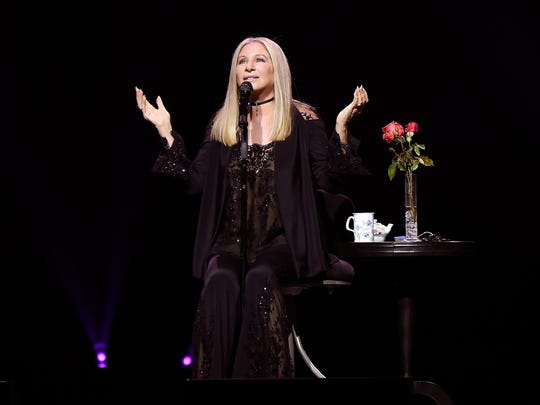 Barbra Streisand performs on stage during the first part of the tour