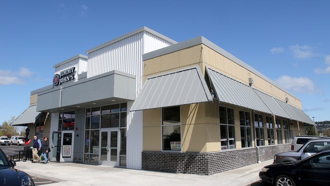 Five Guys Burgers and Fries, a rapidly expanding restaurant chain, will soon share a building with Jimmy John's off Kitsap Mall Boulevard in Silverdale.