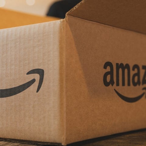 An open Amazon box on a table