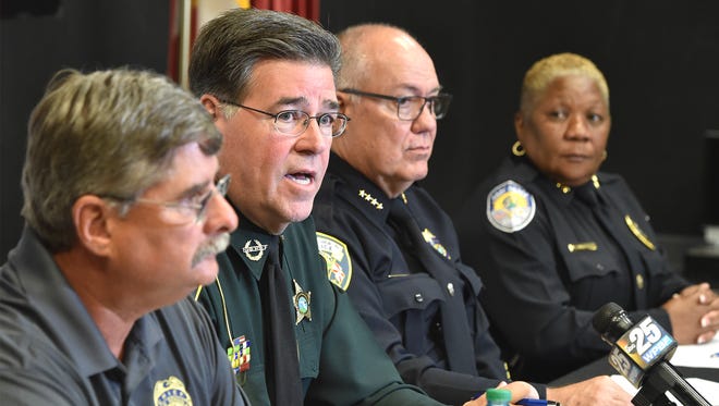 St. Lucie County Sheriff Ken Mascara (second from left) commented on school safety while answering questions from the media, along with (from left) Brian Reuther, St. Lucie Public Schools security, Port St. Lucie Police Chief John Bolduc, and Fort Pierce Police Chief Diane Hobley-Burney, at Allapattah Flats K-8 school in Port St. Lucie. "This is a fluid process of us looking at after action reports of events like at Parkland and working together and creating new initiatives and new protocol to keep our children safe in schools," Mascara said.