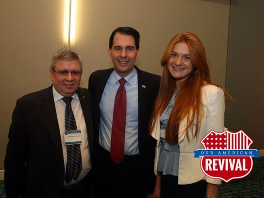 Gov. Scott Walker is pictured in 2015 with Alexander
