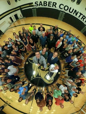 Franklin High School administrators and teachers pose for a 360 photo in the FHS gym during teacher in-service before school starts.