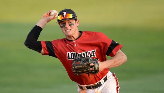 University of Louisville second baseman Nick Solak throws to first base during the University of Louisville vs. University of Kentucky baseball game last season.