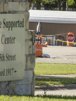 A man is screened upon arriving Thursday at the Austin State Supported Living Center amid the coronavirus pandemic. The center is among dozens of government-funded homes for individuals with disabilities in Texas that have COVID-19 cases.