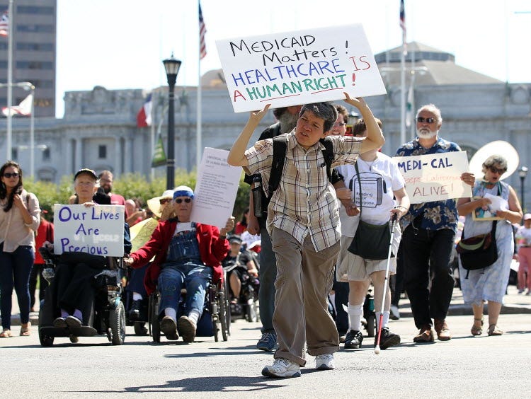 Disabled people protest cuts to Medicaid in San Francisco.