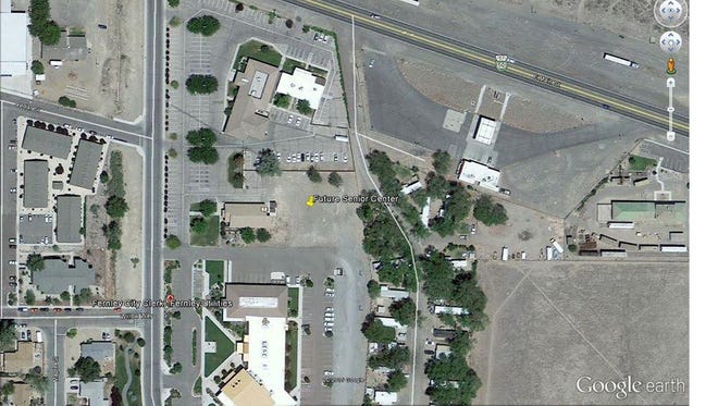 This is an aerial photo of Lyon County and city of Fernley government buildings along Main Street and Silver Lace Boulevard. A possible future site for a new Fernley Senior Center and county office complex is marked at the center photo.