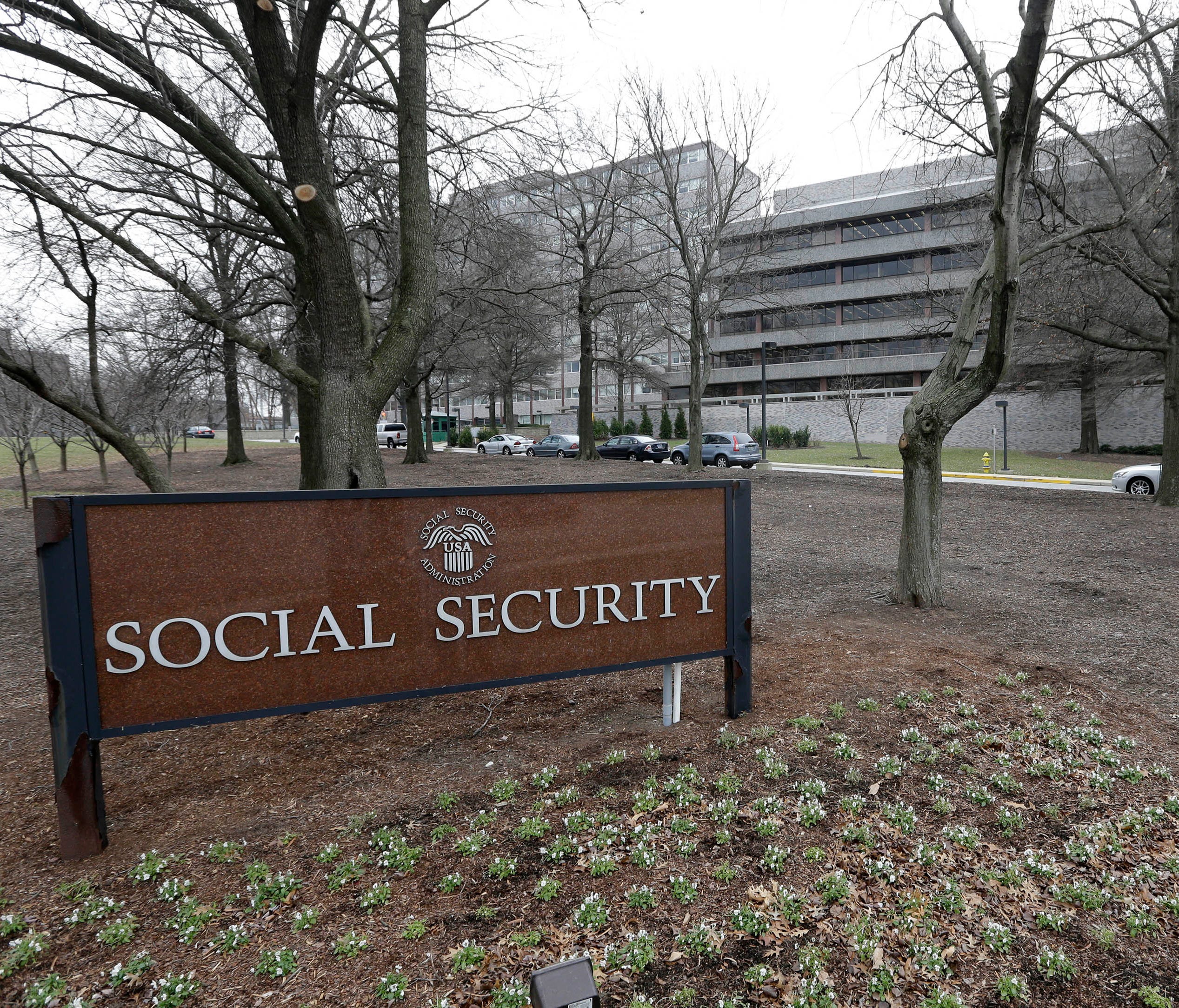 FILE - In this Jan. 11, 2013 file photo, the Social Security Administration's main campus is seen in Woodlawn, Md. Millions of Social Security recipients and other retirees can expect another small increase in benefits in 2018. Preliminary figures su