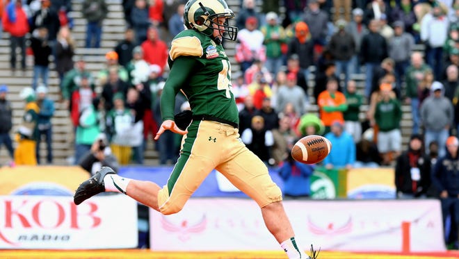 CSU's Hayden Hunt, pictured punting out of his own end zone in the 2013 New Mexico Bowl, was named one of 10 semifinalists Friday for the 2015 Ray Guy Award. Hunt leads the nation in net punting and is fourth in overall punting average.