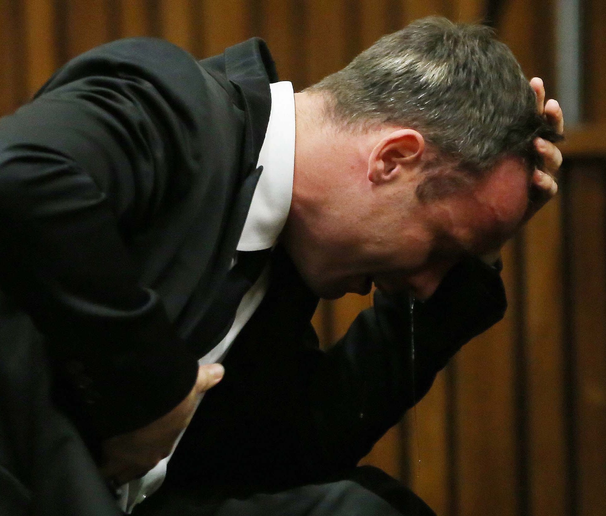 Oscar Pistorius weeps as he listens to evidence by a pathologist in court in Pretoria, South Africa, on April 7.