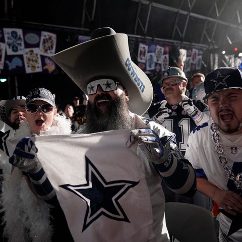 Dallas Cowboys fan cheer during the second round o