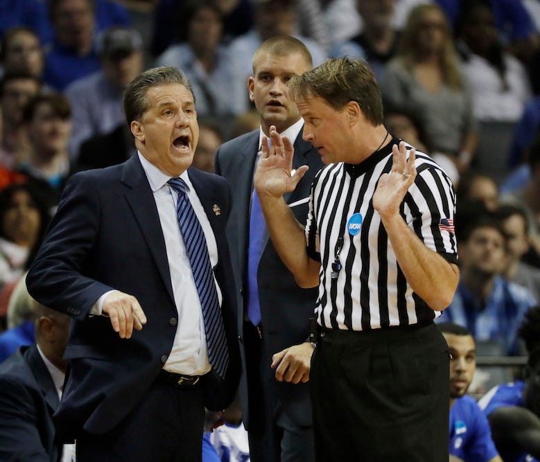 Kentucky head coach John Calipari argues a call in the first half of the South Regional final game against North Carolina in the NCAA college basketball tournament Sunday, March 26, 2017, in Memphis, Tenn. (AP Photo/Mark Humphrey) ORG XMIT: TNMS