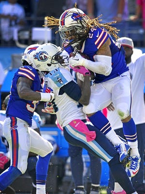 Bills cornerback Stephon Gilmore, right, intercepts a pass intended for Titans wide receiver Kendall Wright to seal Buffalo's 14-13 win on Oct. 11, 2015.