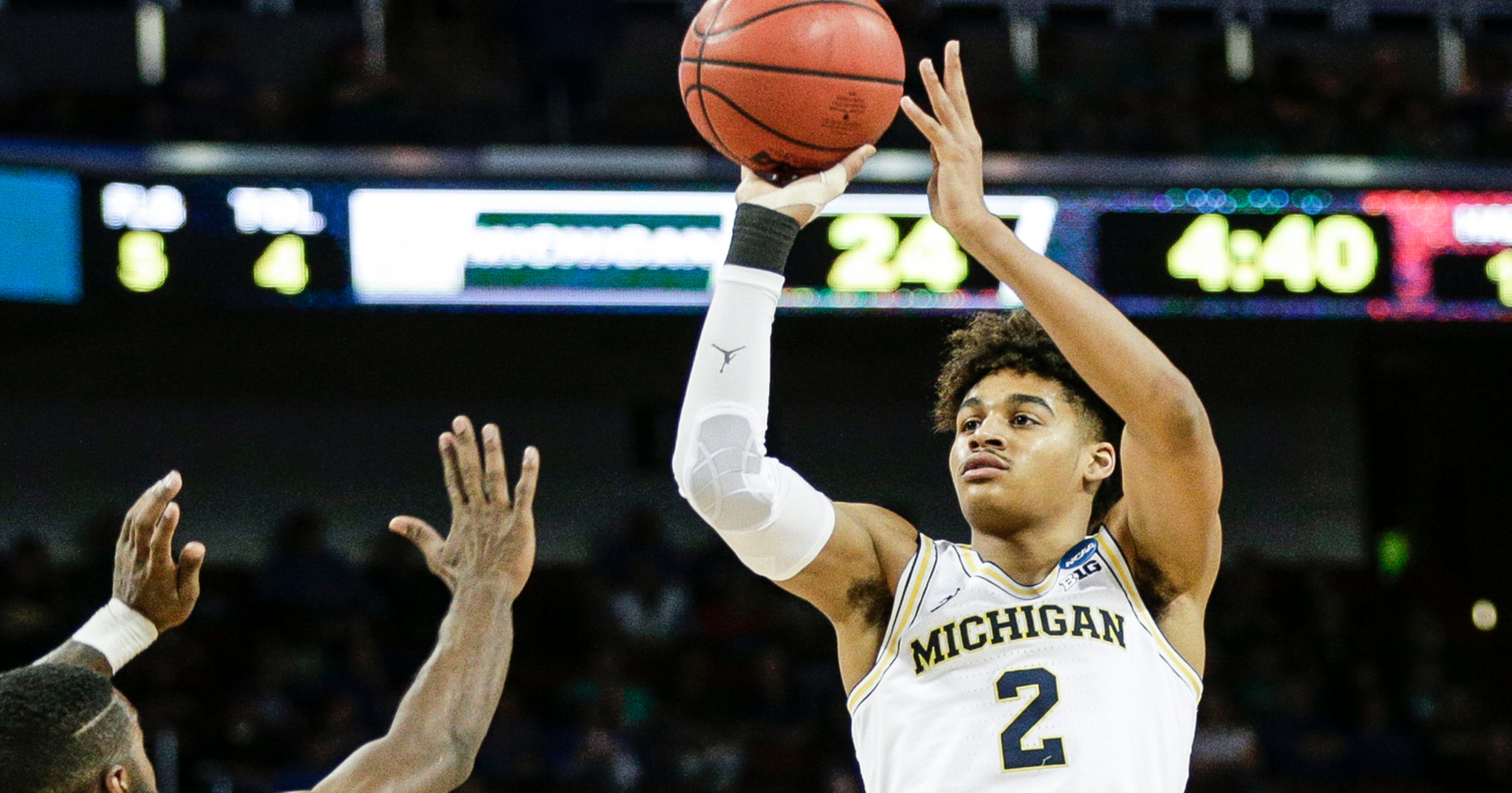 Watch Michigan's Jordan Poole stuns Houston with gamewinning 3