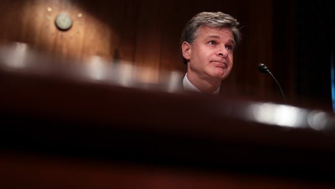 Wray listens during a Senate Homeland Security and Governmental Affairs Committee hearing on threats to the homeland on Sept. 27, 2017.