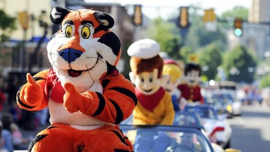 Tony the Tiger and company cruise along during this year’s Cereal City Festival Parade.