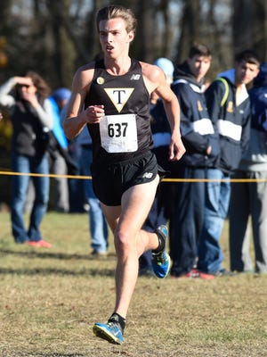 Tatnall's Joey Garrett wins the Boy's Division II DIAA Cross Country State Championships at Killens Pond State Park in Felton.