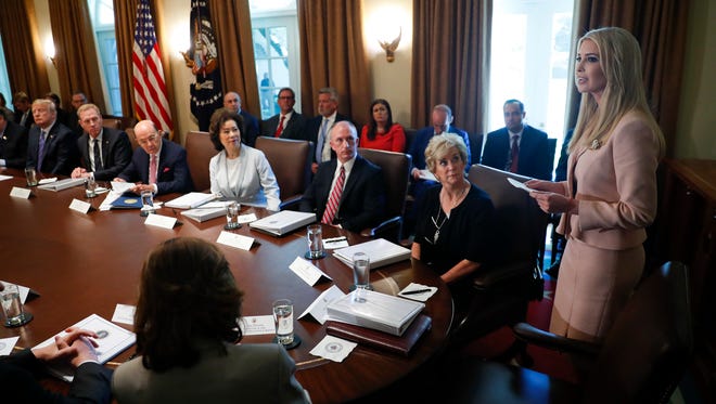 President Donald Trump, far left, listens to Ivanka Trump, during Cabinet meeting.