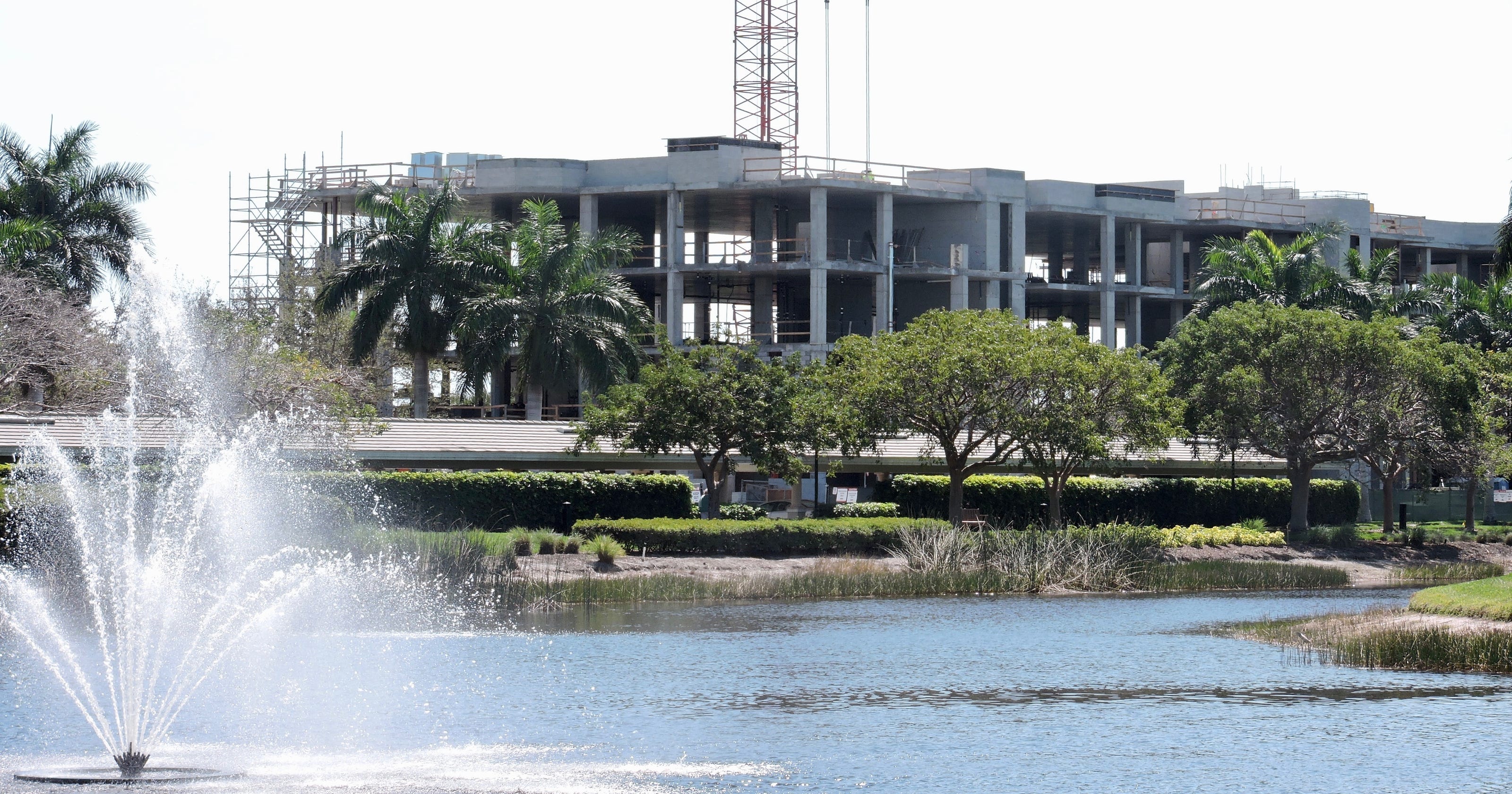 Moorings Park celebrates building’s topping off